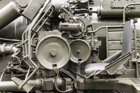 Old military equipment. Fragment of the old Soviet cannon. Russian military equipment. Control levers.の写真素材