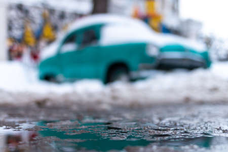 Russia, Moscow - January 31, 2019. Old Soviet car Volga. Turquoise retro car covered with snow....