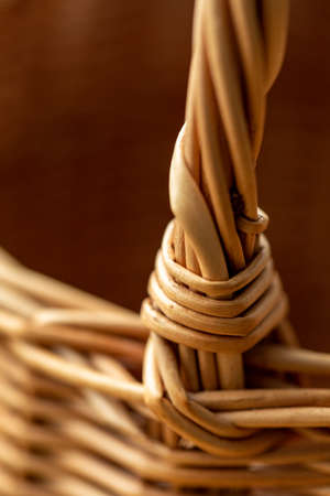 Wicker basket. Wooden basket. Rattan basket. Detail of a rattan basket. Wicker surface. Harvest and countryside background.の写真素材