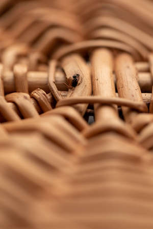 Wicker basket. Wooden basket. Rattan basket. Detail of a rattan basket. Wicker surface. Harvest and countryside background.の写真素材