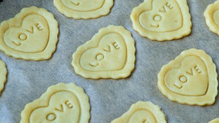 Heart shaped butter home made cookies biscuits with word love. Love, romance, saint Valentine day