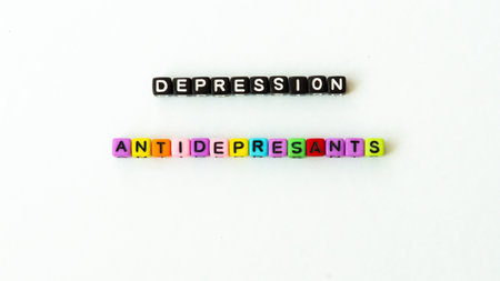 Depression word in black letter beads on white background. Mental health concept. Mock up templateの写真素材