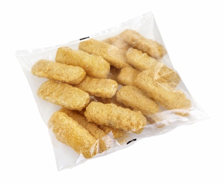 Pack with ready-to-cook meat nuggets isolated on white backgroundの写真素材