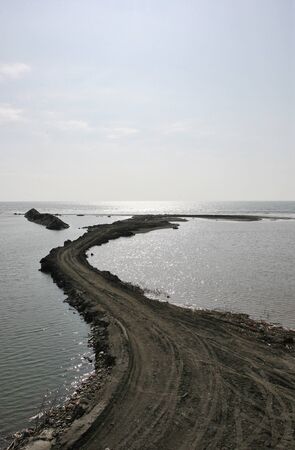 view of dirt road in seaの写真素材