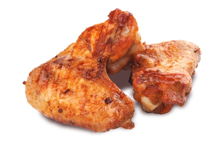 Roasted chicken wings isolated on white backgroundの写真素材