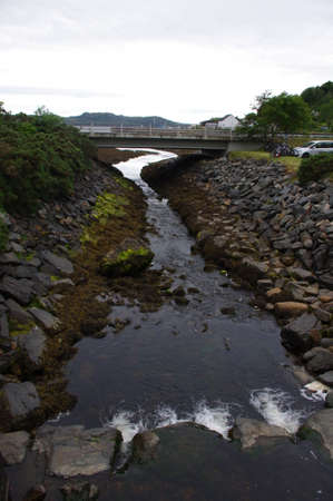 Old vintage brick bridge in Gariloch Scotlandの写真素材