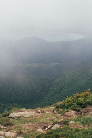 Landscape in Ukrainian Carpathians with foggy weather before rain