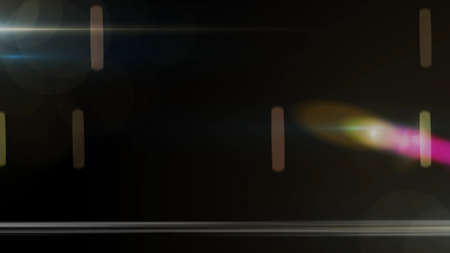 Real Lens Flare Shot in Studio over Black Background. Easy to add as Overlay or Screen Filter Photosの写真素材
