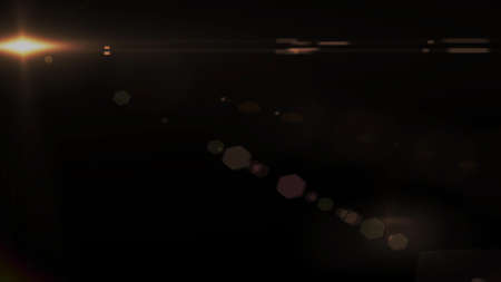 Real Lens Flare Shot in Studio over Black Background. Easy to add as Overlay or Screen Filter Photos