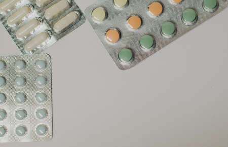 Medicines on a gray background of a different colorの写真素材
