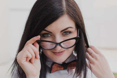 Modern business, woman near the office ponders business planの写真素材