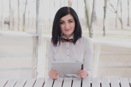 Modern business, female businesswoman working outdoors over a new ideaの写真素材