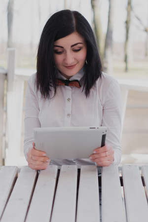Modern business, female businesswoman working outdoors over a new idea