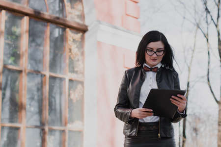 Modern business, female businesswoman working outdoors over a new ideaの写真素材