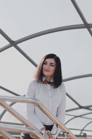 Modern business, female businesswoman working outdoors over a new ideaの写真素材