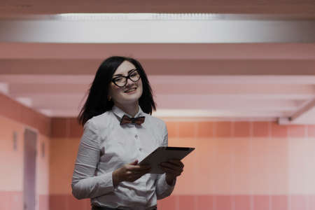 Modern business, female businessman is working in an underground passage over a new ideaの写真素材