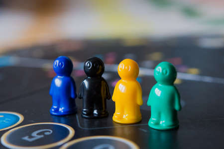 Multi-colored chips for tabletop game in the form of little men.の写真素材