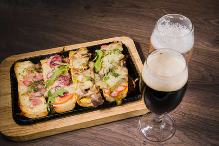 Snack to beer in the form of sandwiches with meat.の写真素材