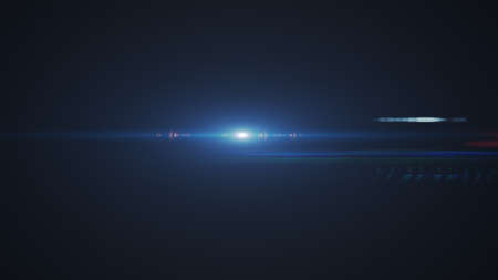 Abstract of lighting digital lens flare in dark backgroundの写真素材