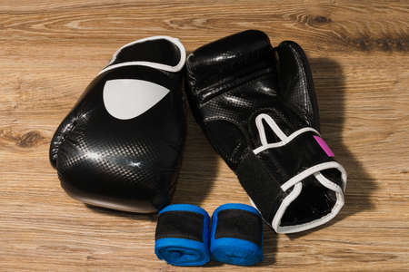 Boxers professional outfit on a wooden background