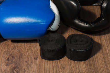Boxers professional outfit on a wooden background