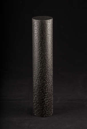 Wooden product made of wood on a black backgroundの写真素材