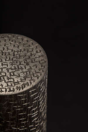 Wooden product made of wood on a black backgroundの写真素材