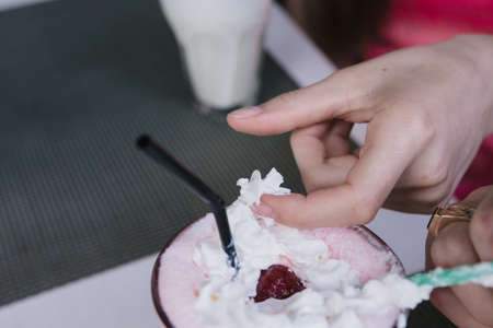 Young couple hugging and smiling at each other in the parkの写真素材
