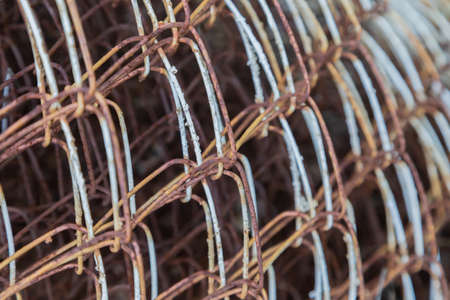 Iron mesh for fence with rust and paint.の写真素材