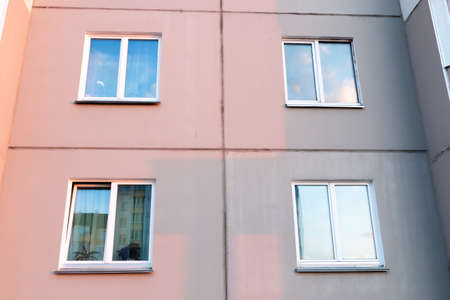 Three windows on the wall, the texture of the window background.