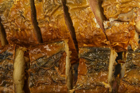 Sliced herring on a plate with herbs.の写真素材