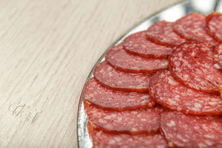 Sausage cuts of different varieties on a plateの写真素材