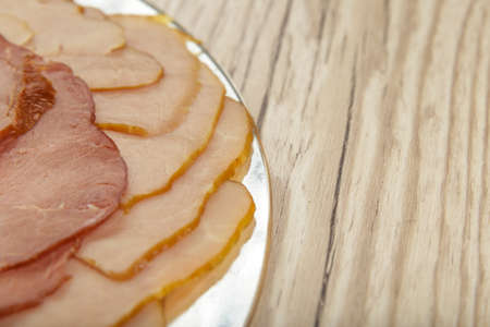 Sausage cuts of different varieties on a plate