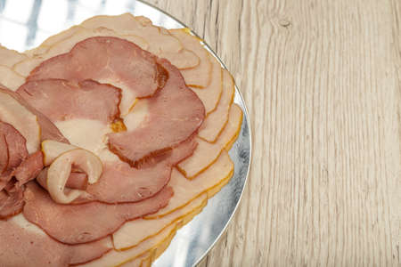 Sausage cuts of different varieties on a plateの写真素材