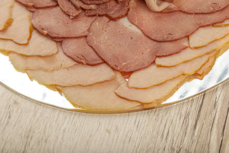 Sausage cuts of different varieties on a plate