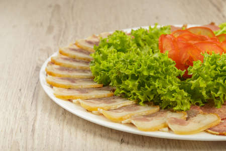 Sausage cuts of different varieties on a plateの写真素材