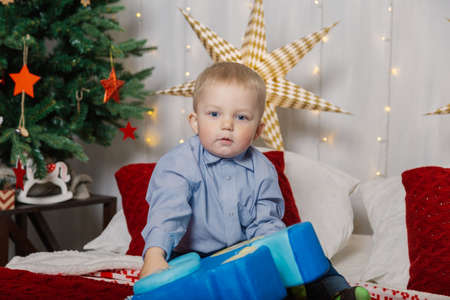 Little boy in the New Years decor. New Year 2019.の写真素材