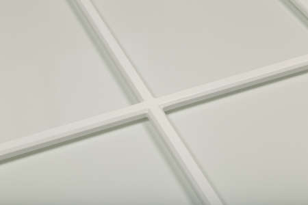 Detail close-up of a white frame facade for the kitchen.