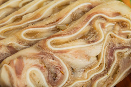 Home-made meat loaf on a wooden surface.の写真素材
