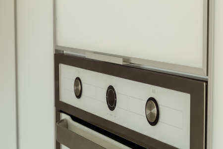Oven panel close-up, regulators and placard for information.の写真素材