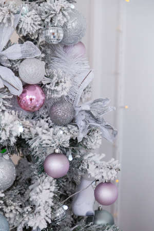 Beautiful silver Christmas tree with decorations. New Year 2020の写真素材