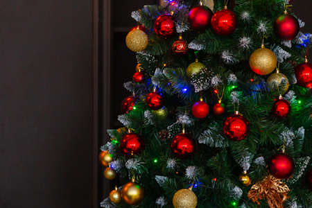 Beautiful green christmas tree with decorations. New Year 2020.