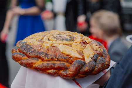 Bread-and-salt welcome. A traditional ritual of offering bread and salt to a welcome guestの写真素材