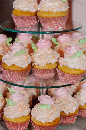 Beautiful fresh cakes on the festive tableの写真素材