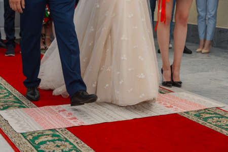 Beautiful newlyweds at the solemn registration of marriageの写真素材