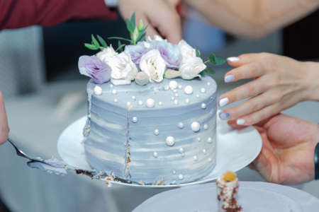 Beautiful wedding cake at a banquet on a happy wedding day.の写真素材