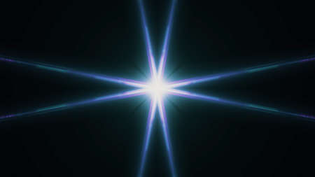 Beautiful lens flare with rays on a black background.
