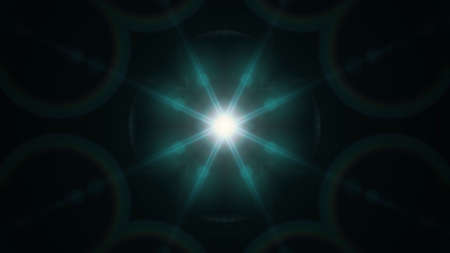 Beautiful lens flare with rays on a black background.