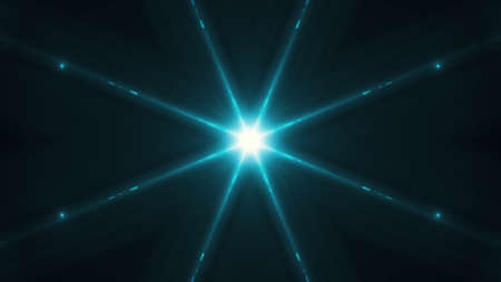 Beautiful lens flare with rays on a black background.