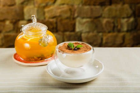 Fresh dessert with cocoa in a transparent bowl.の写真素材